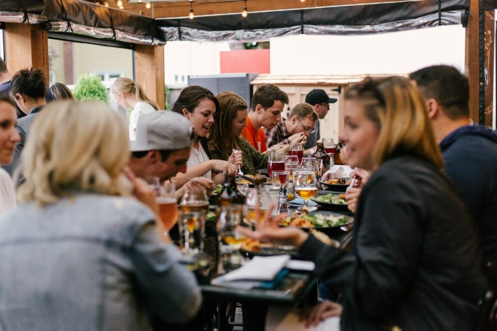 group-of-friends-eating-at-restaurant