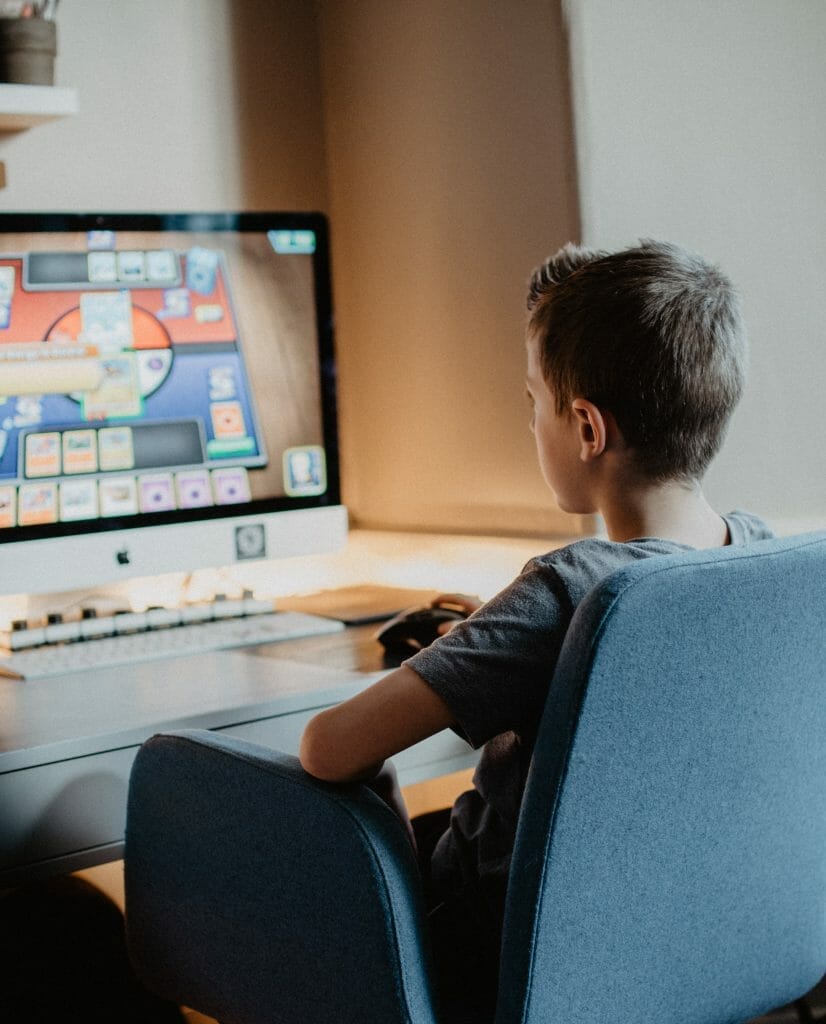 boy doing homework at computer