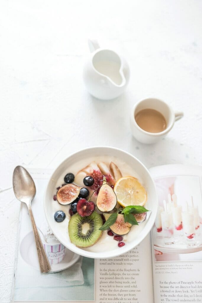 bowl of fruit and coffee cup