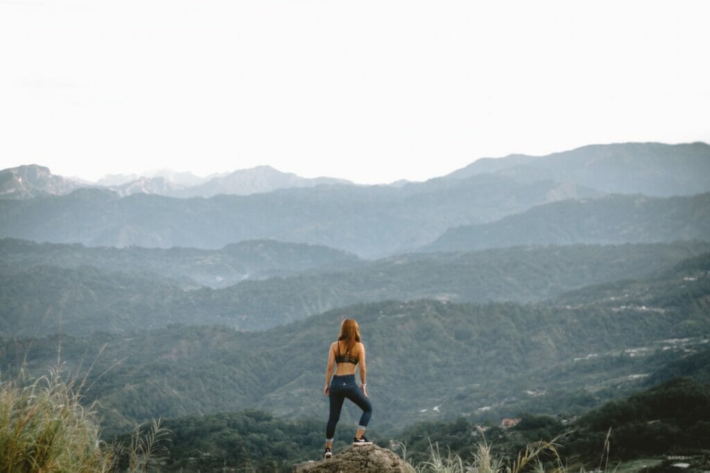 woman working out in the mountains