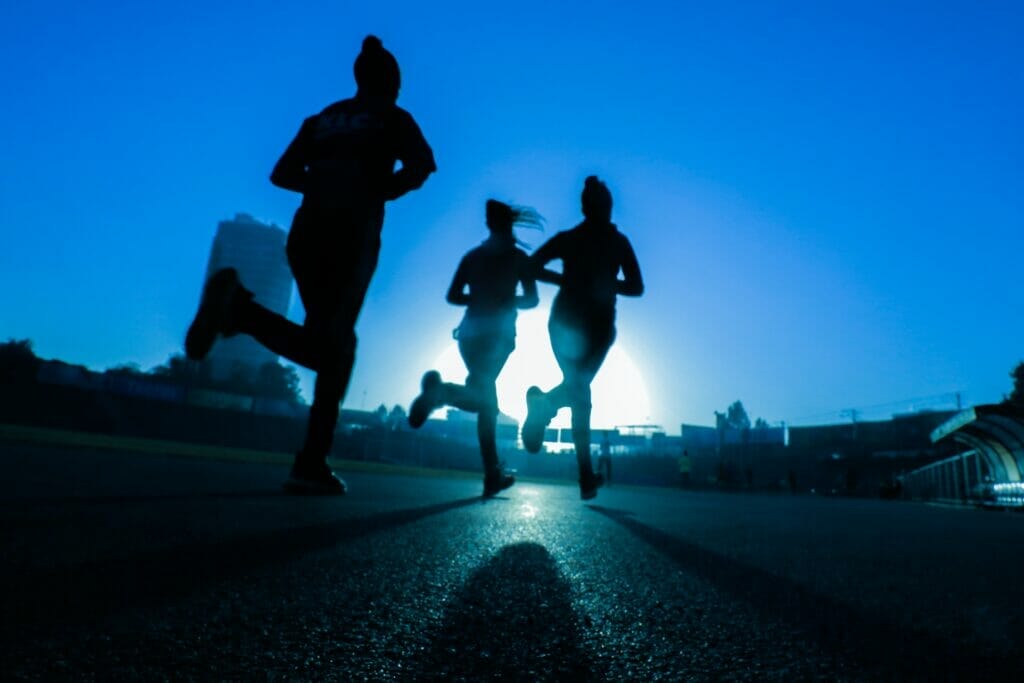 women running in the dark